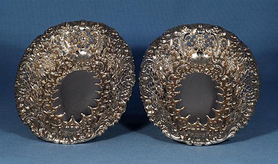 A matched set of four Victorian embossed silver dishes (two pairs), by Horace Woodward & Co/ Ltd, length largest 245mm, weight 56oz